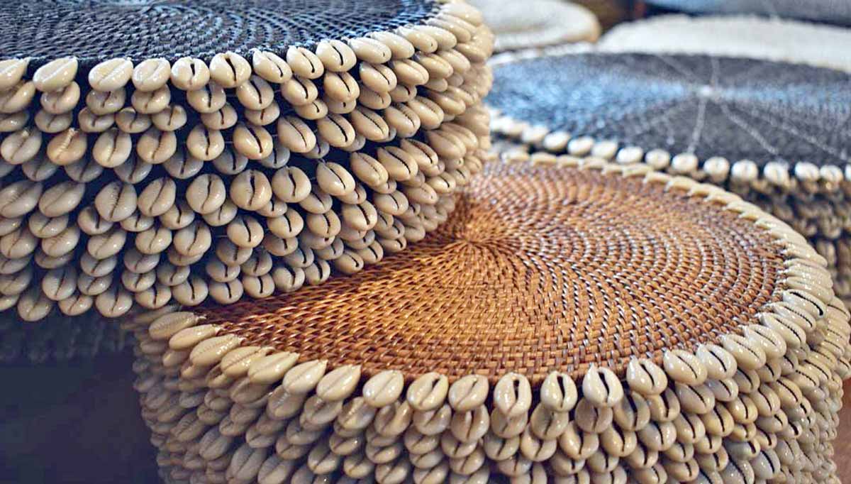 Get your boho placemat on Natural rattan placemats with cowrie shell edge detail
